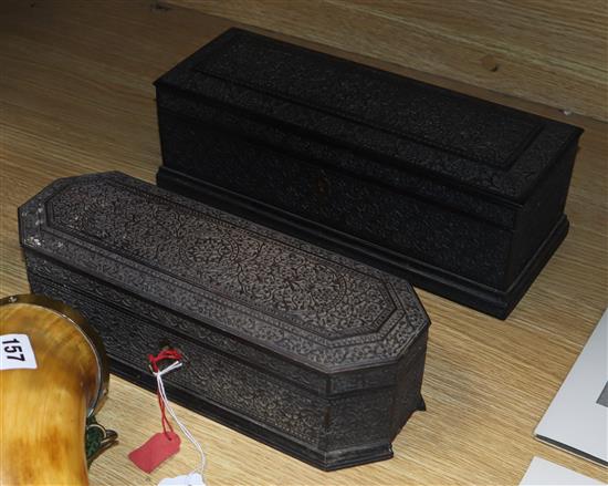 Two 19th century Indian carved ebony and sandalwood lined writing boxes longest 31cm